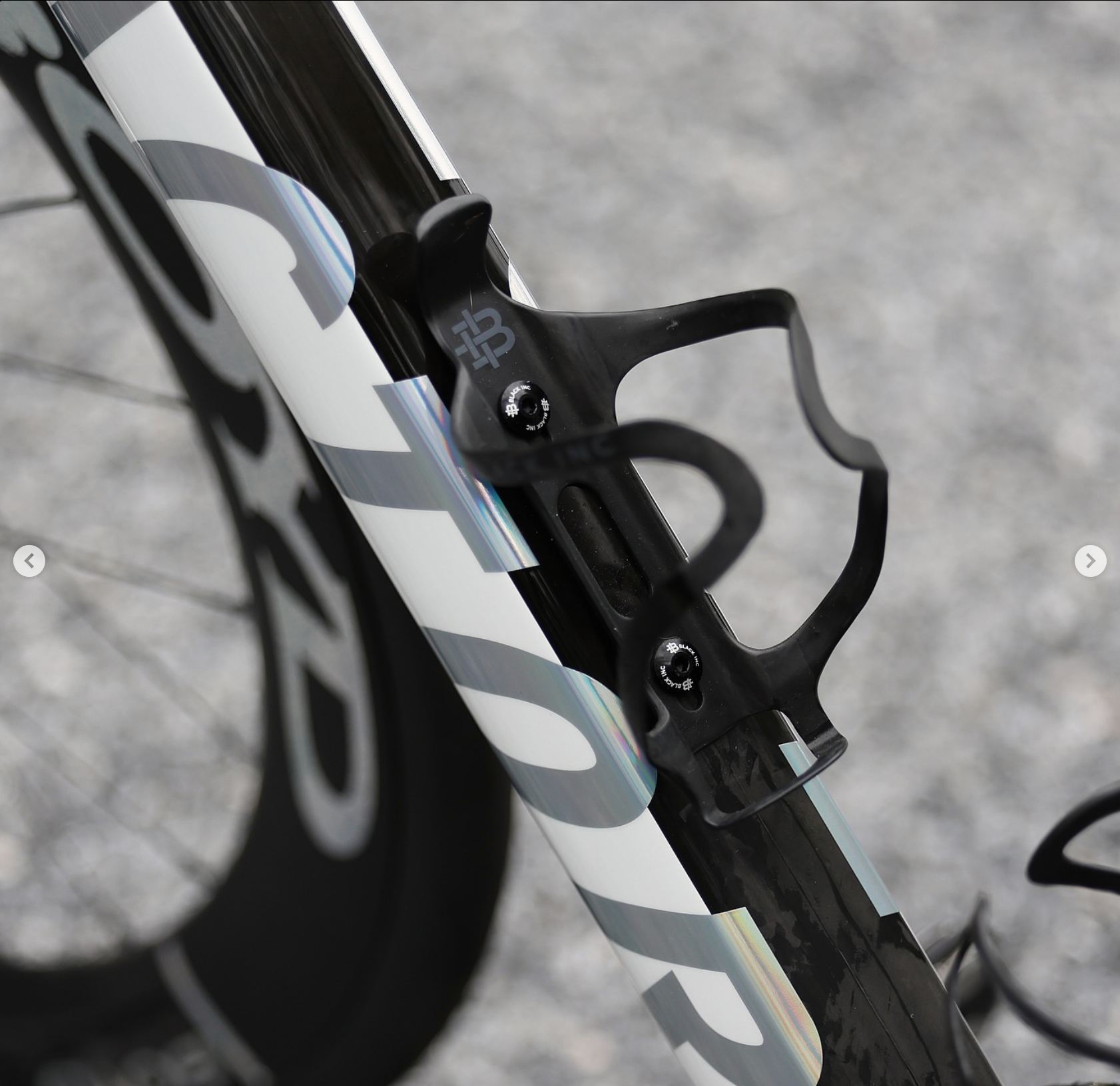 Black Inc carbon bottle cages mounted on Factor Ostro VAM downtube