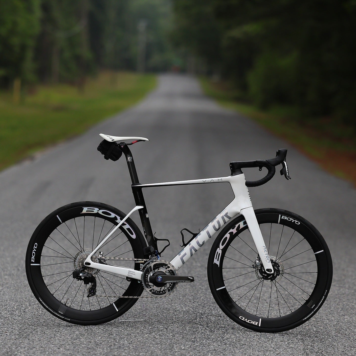 Factor Ostro VAM complete road bike side view with SRAM Red AXS groupset and Boyd carbon wheels
