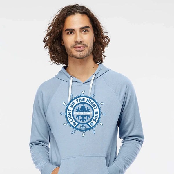 Person wearing the Lewes Lights Holiday Bike Ride hoodie from Lewes Cycle Sports, celebrating the Light Up the Night community bike ride.