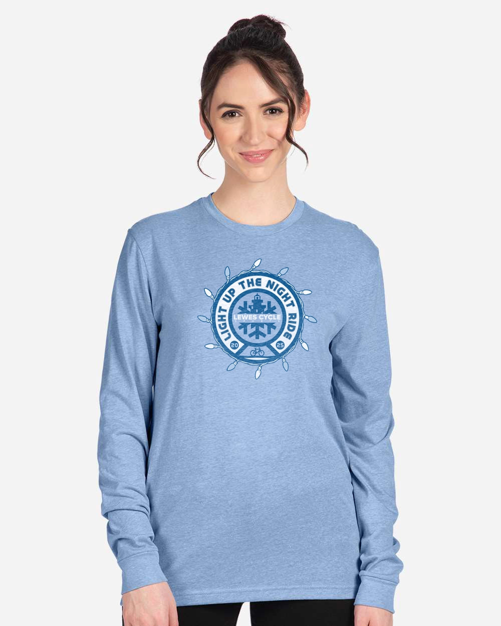 Person wearing the Lewes Lights Holiday Bike Ride long sleeve T shirt from Lewes Cycle Sports during a festive holiday bike ride.