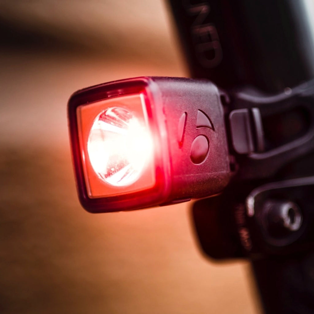Trek Flare R City rear bike light illuminated closeup view mounted on bicycle