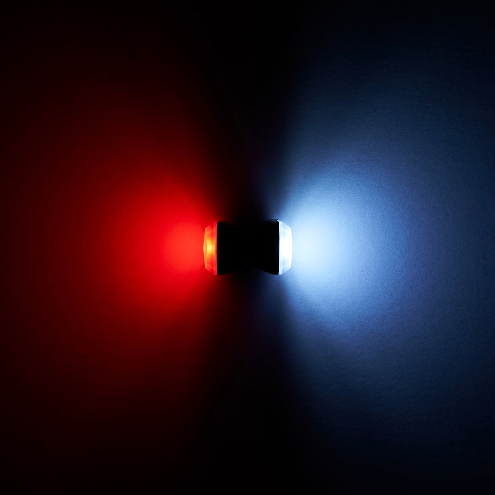 Trek Ion 50 R and Flare R Metro bike lights glowing in the dark