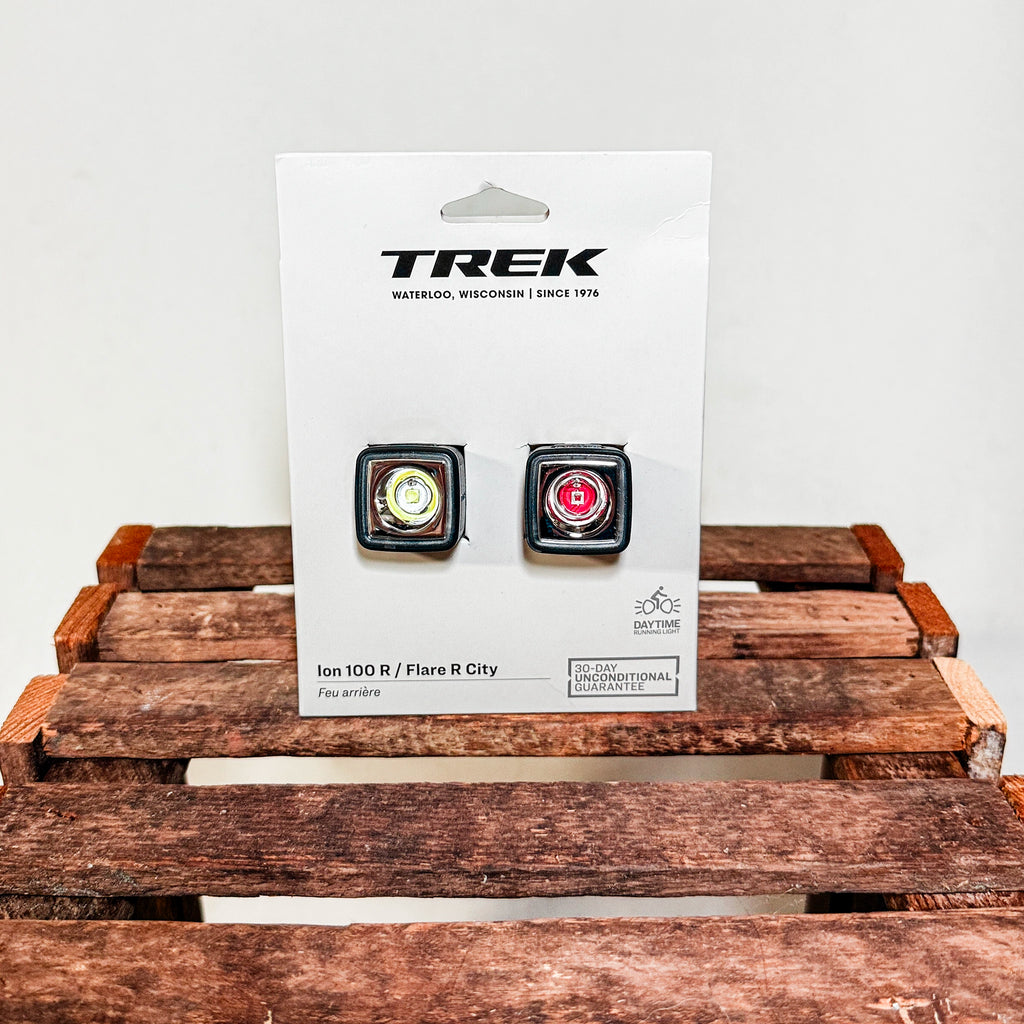 Trek Ion 100R and Flare R City bike light set retail packaging studio photo